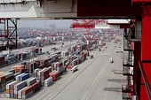 China escalates U.S. trade row, asks WTO to judge dispute