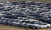 Japan says no barriers to auto imports after U.S. fires trade salvo