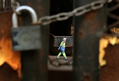 Trump promises to crack down on foreign steel, but delays continue